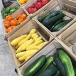 farm produce with zucchini squash and bell peppers